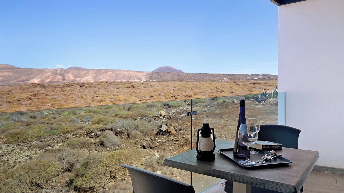 Arrieta Apartment | Holiday Apartment “Callao Beach 10” with Mountain View, Terrace & Wi-Fi