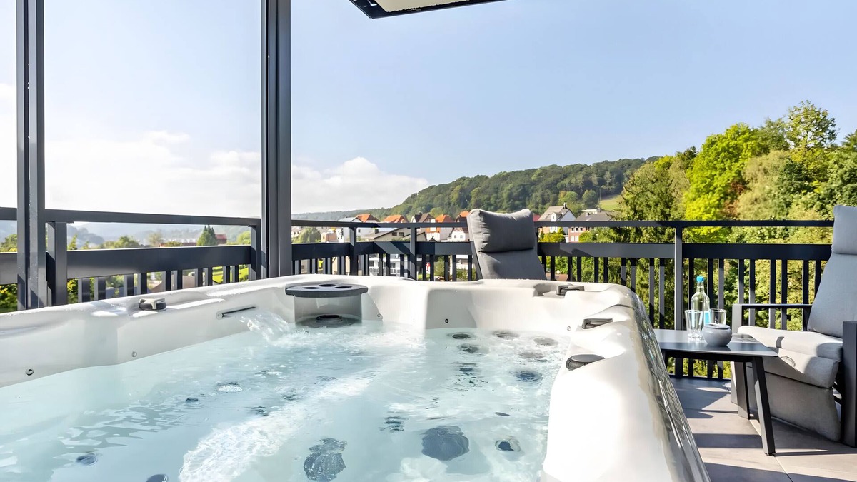 Altenbeken Apartment | Holiday Apartment "Egge Resort 7d" with Balcony, Whirlpool and Sauna with Viaduct View
