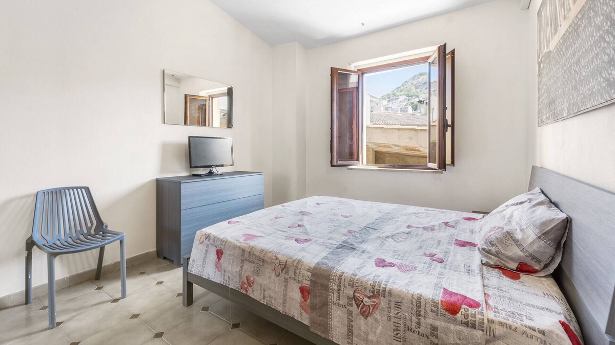 Arbus House | Holiday Home 'Arbus Aventino Centrale' with Private Terrace and Air Conditioning
