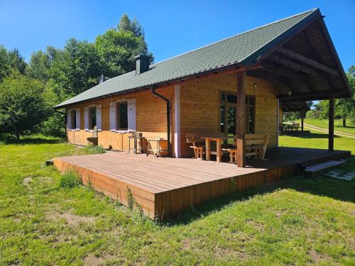 Szczecinek House | Holiday Home by Lake Wierzchowo with Boats