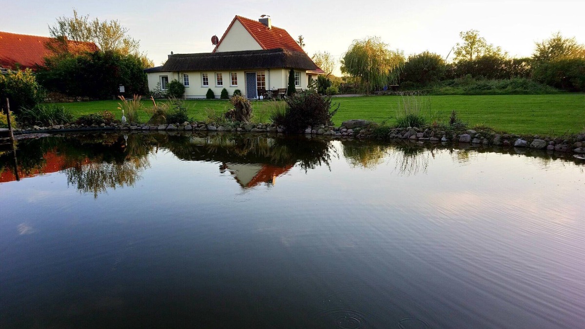 Kalkhorst House | Holiday Home "Naturteich Haus" with Private Swimming Pond, Private Terraces & Wi-Fi