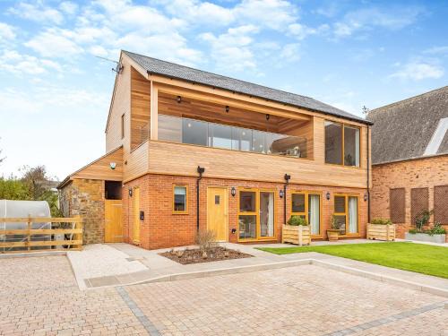 Twywell House | Hollyhocks - Uk47975