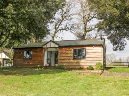Busbridge House | Holm Oaks Cottage