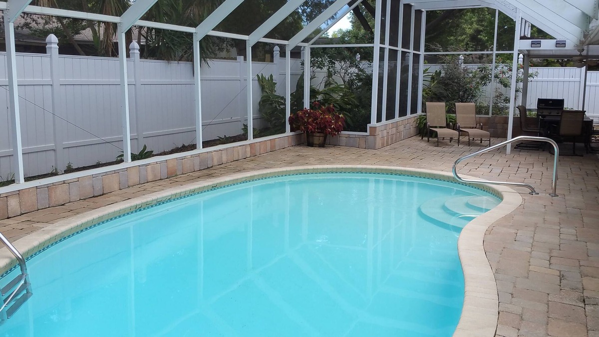 Tarpon Springs House | Home away from Home? Paradise in the Sun? Why not call it both! HEATED Pool !