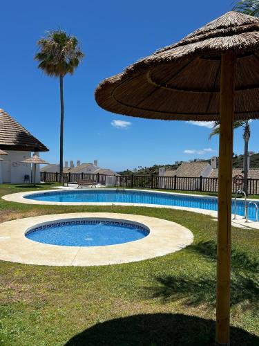 San Roque Apartment | Home in Alcaidesa - sea & golf view with swimming pool