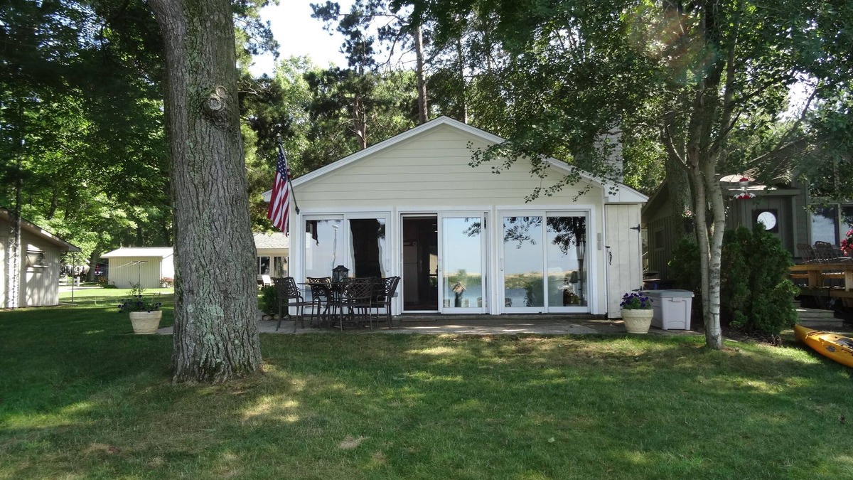 Mears Cottage | Home on the lake. Walk out your door for Swimming, boating or morning coffee.