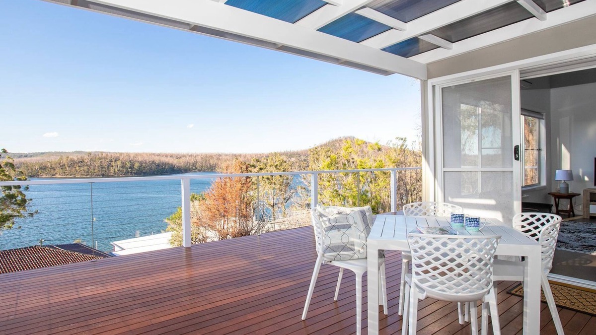 Lake Conjola House | Home On the Water Enjoy a relaxing lakeside hideaway at this charming and cosy