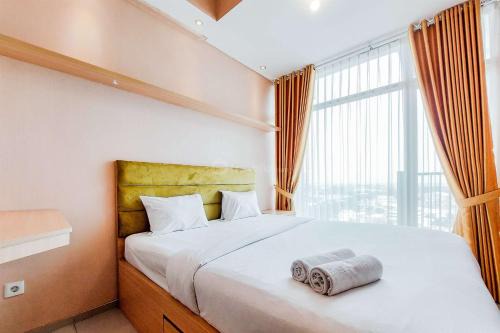 Cikokol Apartment | Homey and Modern Studio at Tree Park City Cikokol Apartment By Travelio