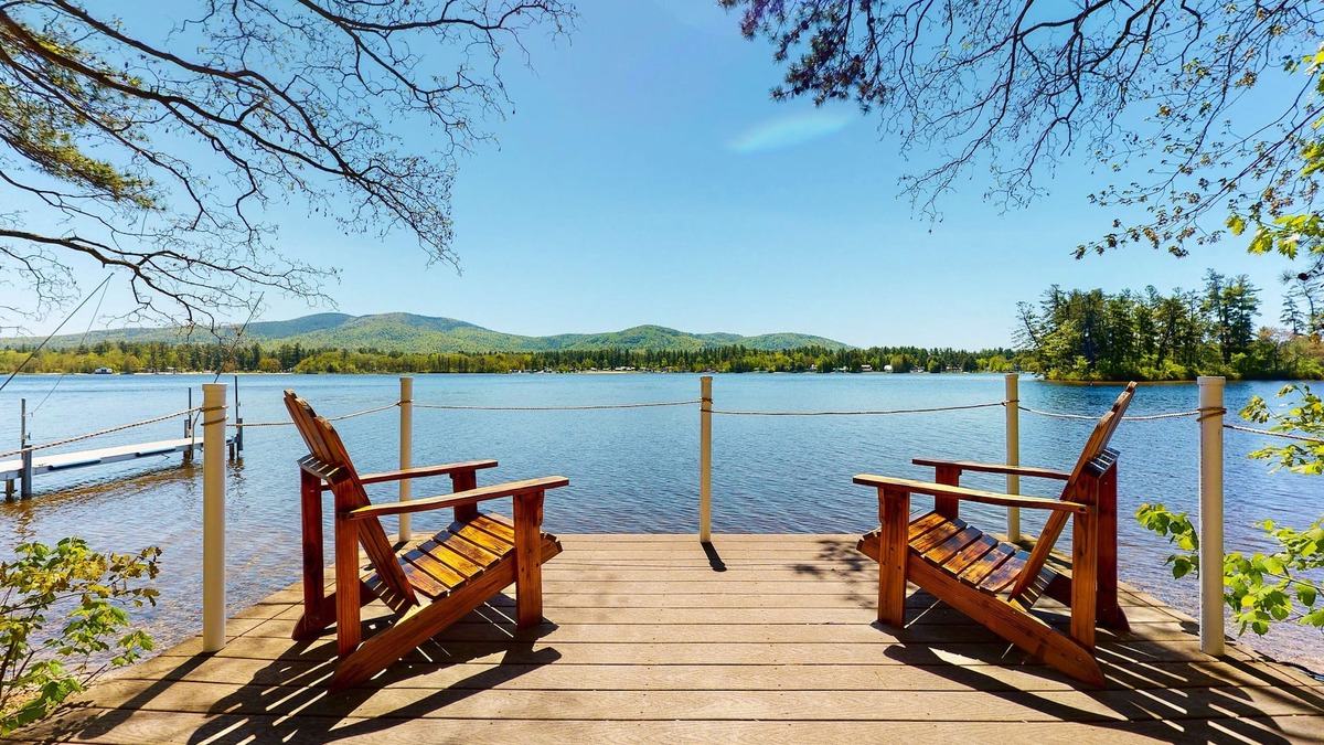 The Bays House | Homey lakeside property w/one house, two cottages, mtn. views, & private beach