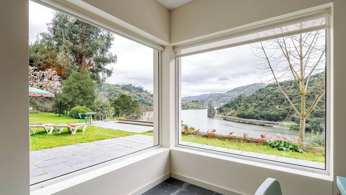 Resende House | HostWise – Riverside Retreat w/Infinity Pool