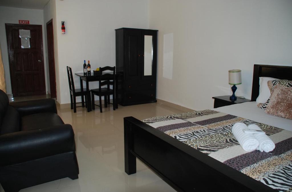 San Pedro Hotel | Hotel Coastalbay 2 & Golf Cart Rental