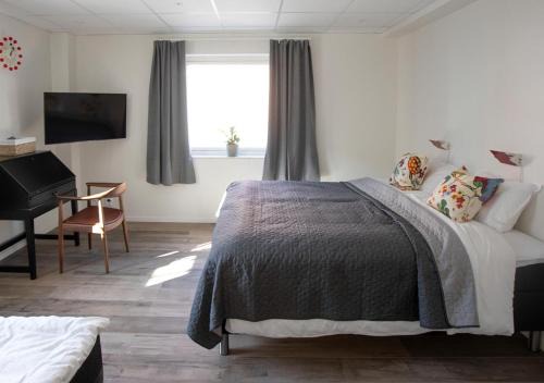 Karlholmsbruk Hotel | Hotell Havsporten