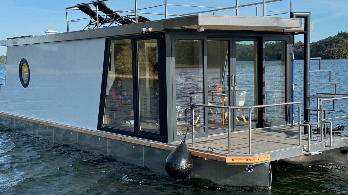 Dobin am See Boat Rental | House Boat 'Seahome' with Lake View, Private Terrace and Wi-Fi