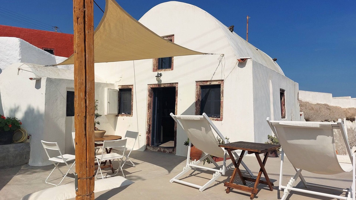 Finikia House | House of the Seven Ships. Cycladic traditional house with sea and sunset view