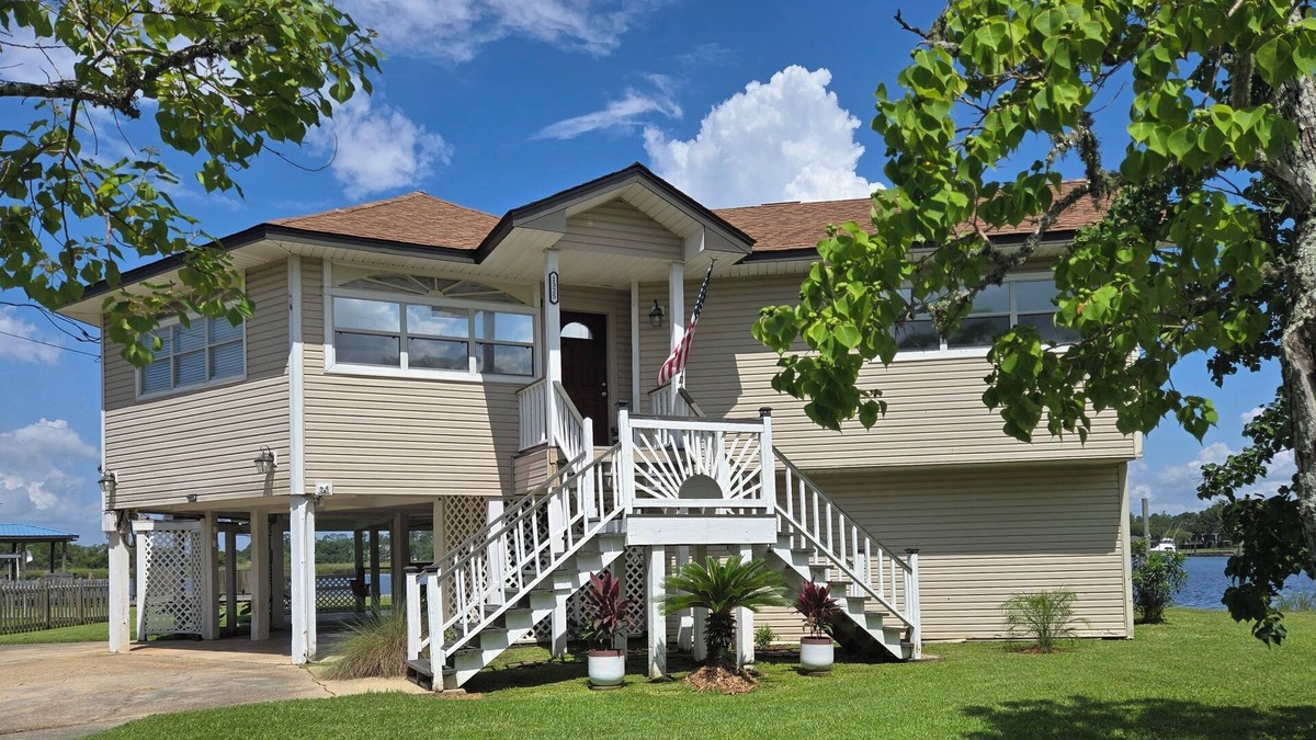 Gulfport House | House on the back bay with a boat launch, two kayaks and a pedal boat on site!