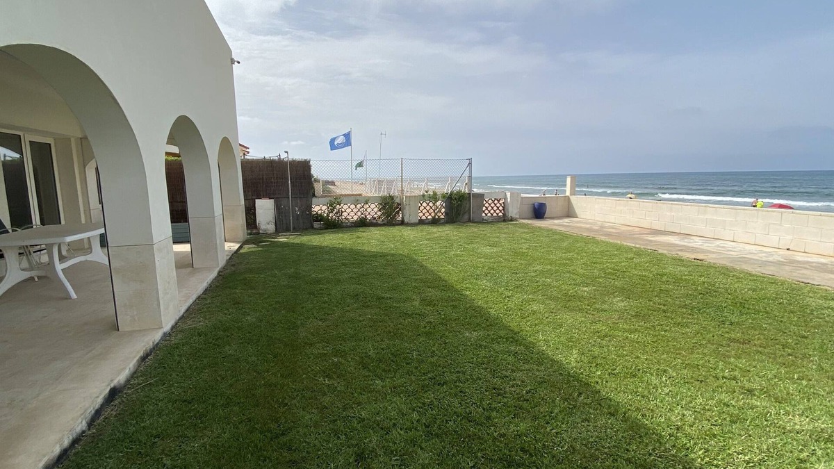 Les Deveses House | House on the beach 30 meters from the sea, first line
