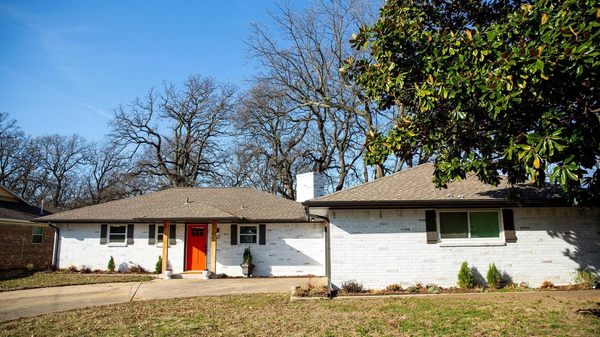 Checotah House | House on the lake with a large sandy beach just steps from the back door.