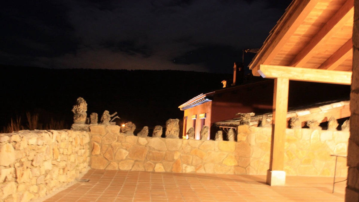 Una Cottage | House the Escalerón I | La Laguna Accommodation. Patio, barbecue and fireplace.