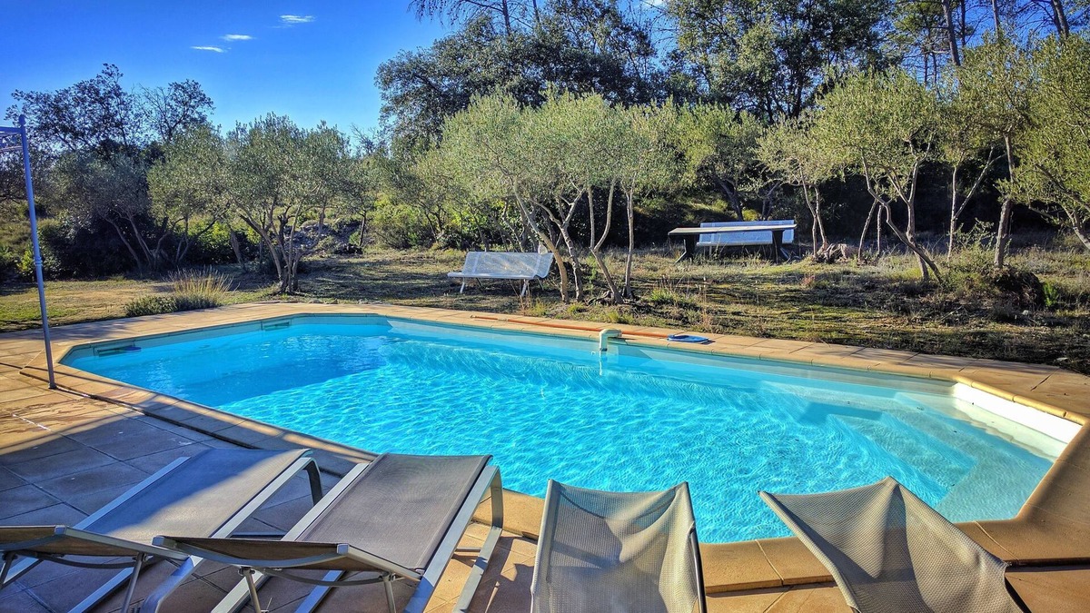 Saint-Bauzille-de-Montmel Villa | House view over cliff and olivette