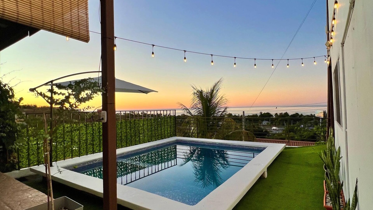 Santa Tecla House | house with a beautiful sea view in enchanting SurfCity with WiFi, AC and Pool.