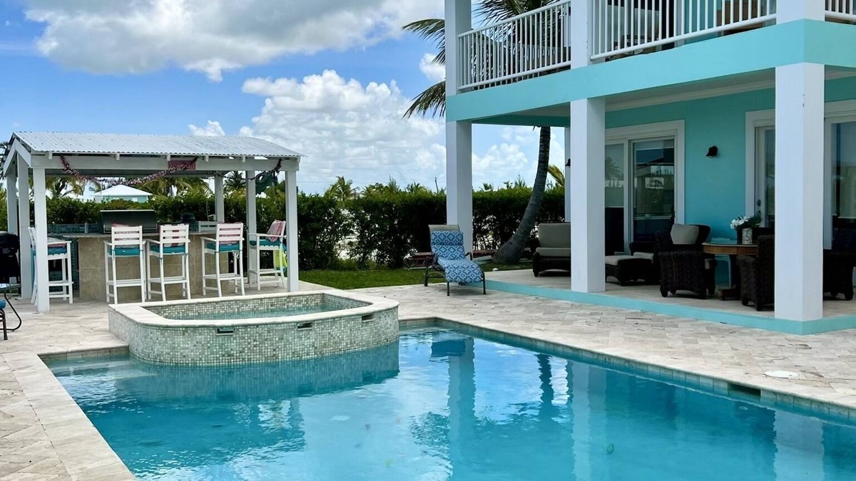 Treasure Cay House | House with Pool, Tiki Bar, and Dock/Boat Slip in Treasure Cay, Abaco