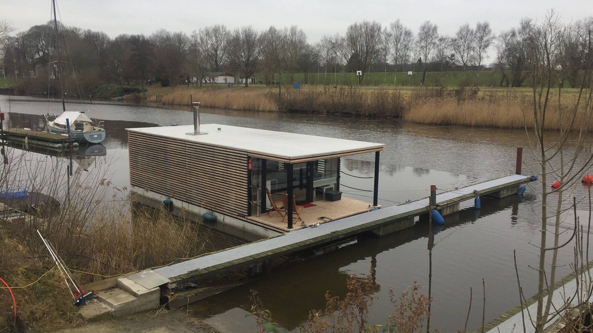 Rustersiel Boat Rental | Houseboat HT 4; with fireplace for 4 people in an idyllic location in Wilhelmshaven