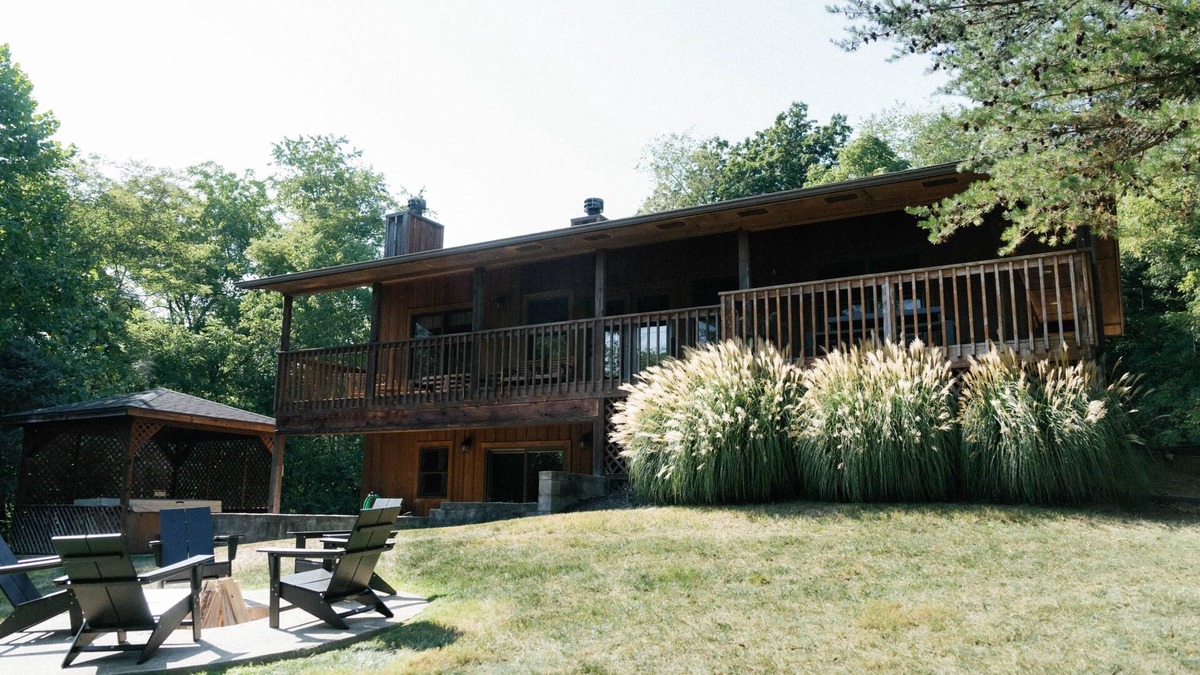 Logan Ski Chalet | Houston Lodge, 5BR Lodge with a large covered porch and a great view