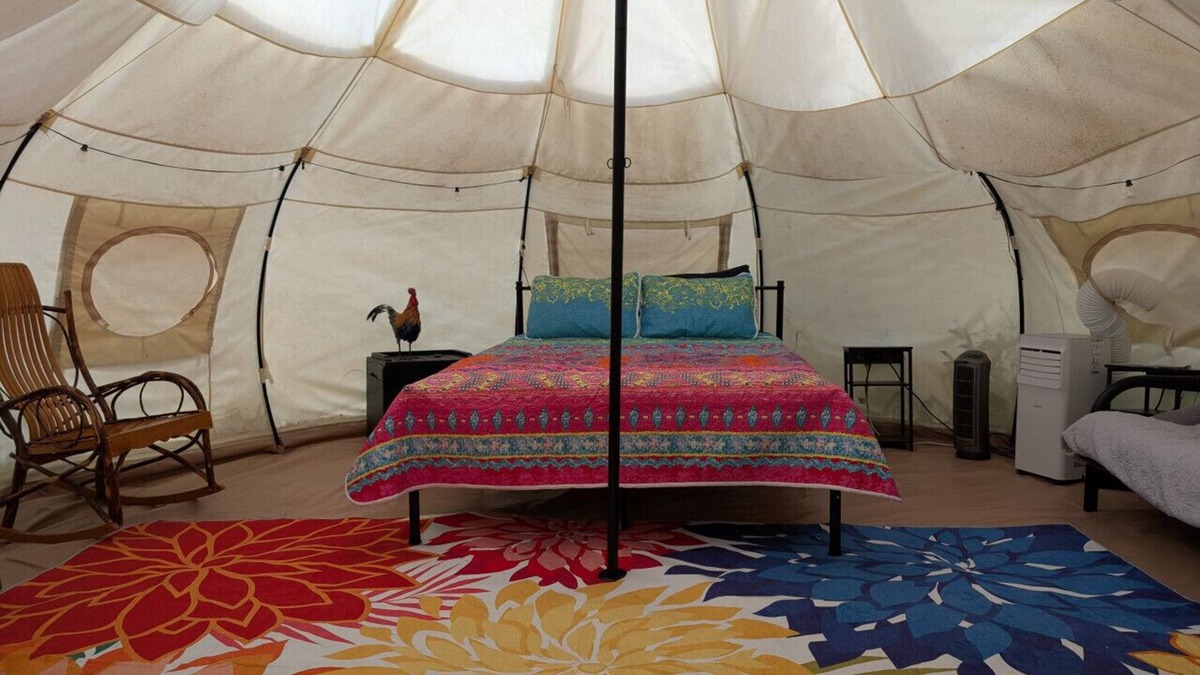Kasbeer RV Rental | Huge Heated Tent w/King Bed on 175 Acre Farm