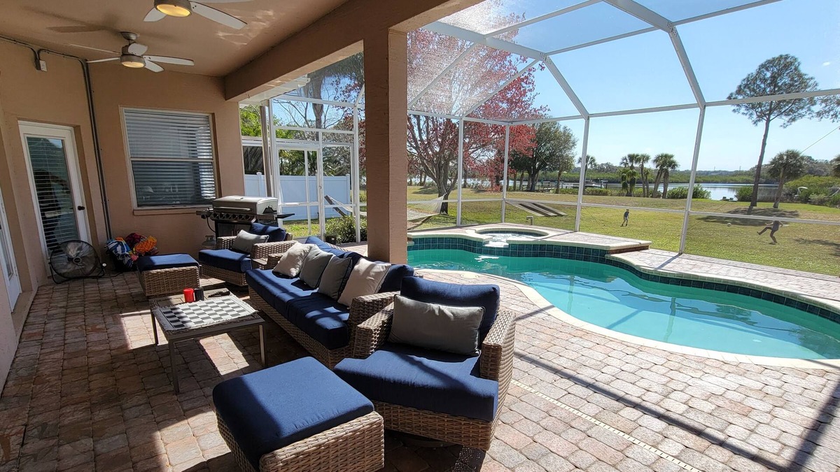 Tarpon Springs House | Huge Riverfront Home! Heated pool, Jacuzzi, and Kayaks Included!