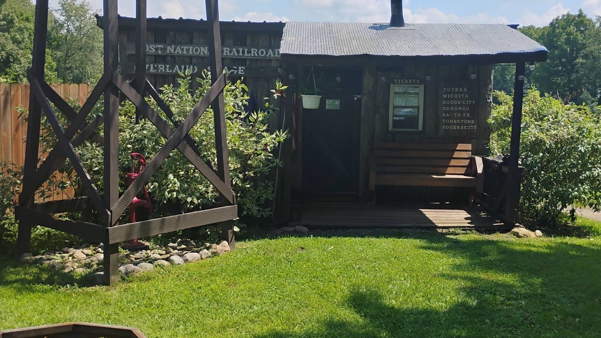 Frontier Cabin | Hunting Cabin Rustic Handcrafted primitive sits in our unique rustic Cowboy Town
