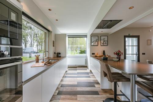 Moerkerke House | Huswell - Holiday home along the canal with great views