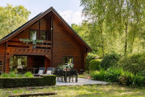 Knesselare Ski Chalet | Huswell - Tranquil retreat, cozy chalet in the heart of Urse