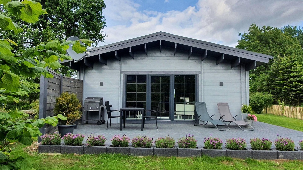 Martensrade House | Idyllisches Blockbohlenhaus mit eigenem Garten und Sauna zum Wohlfühlen