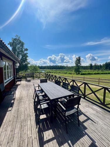 Osthammar House | Idylliskt hus med sjöutsikt.