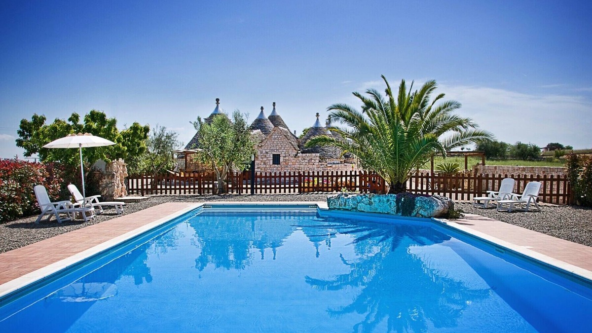 Martina Franca House | Il Ciliegeto: 1800s trullo house with views of pool, vineyard and Itria Valley
