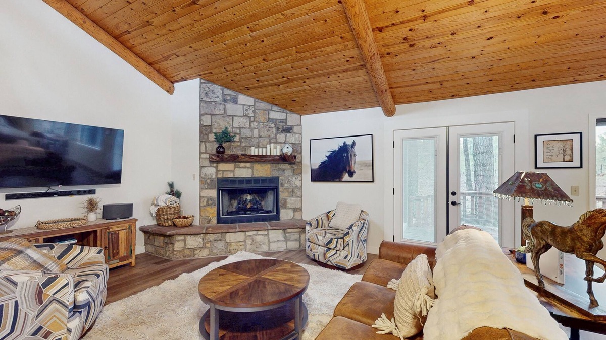 Pinetop House | Immerse yourself in the charm of this delightful cabin tucked among the pines