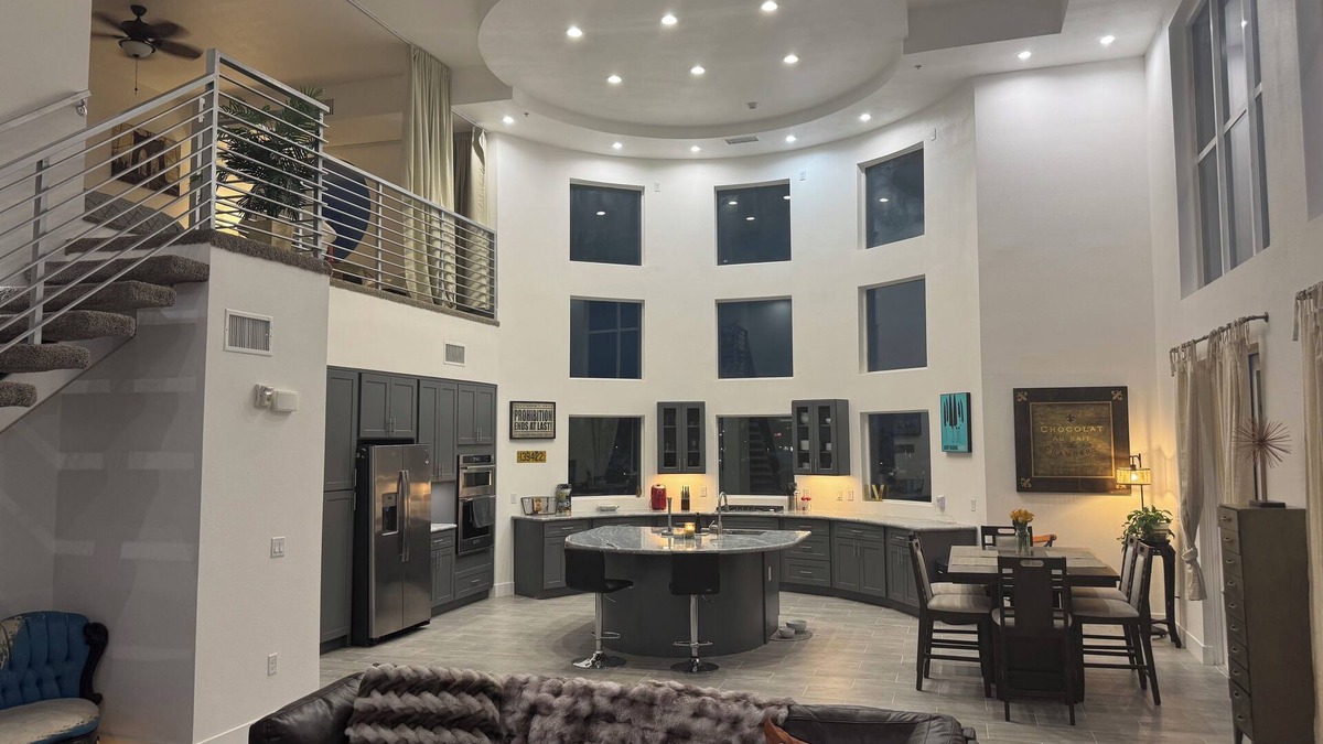 Rancho Oakey Condo | Incredible 2 level loft with 30ft ceilings -expansive balcony with STRIP VIEWS!