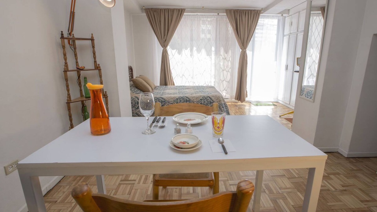 La Colon Apartment | Independent spacious Loft with Private Terrace at La Mariscal Alta Quito