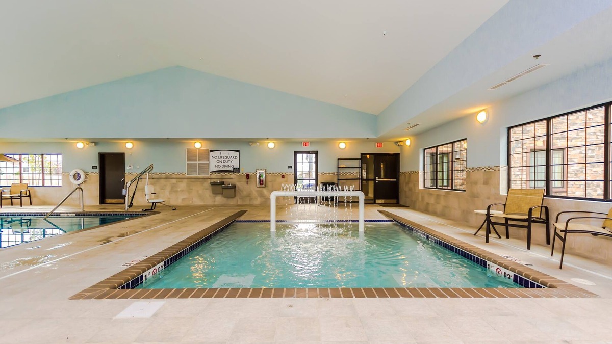 Grand Forks Condo | Indoor Pool & Hot Tub. Free Breakfast. 15 Min Walk to University of North Dakota.