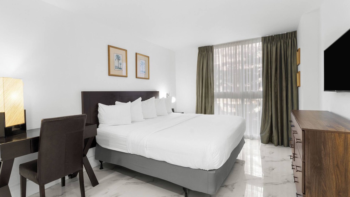 Coconut Grove Hotel | Indulge in Home Like Comfort! 4 Comfortable Units, Onsite Pool, Kitchen