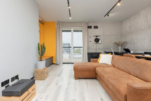 Gorce Apartment | Industrial Pet-Friendly Apartment with Movie Projector by Noclegi Renters