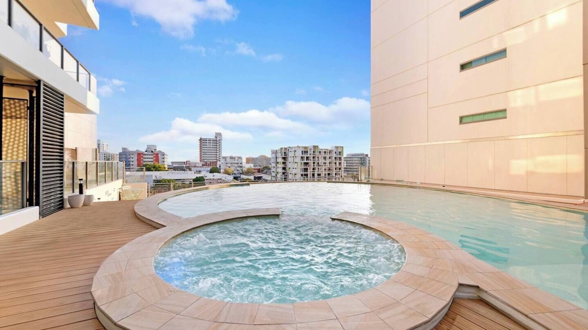 Darwin City Centre Apartment | Inner Bloom Tropical Chic in the CBD with Pool
