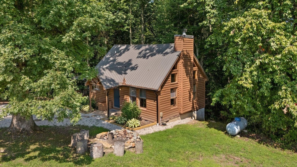 Rogers Cabin | Inviting, charming 2BR, log cabin located in the Scenic Heights neighborhood.
