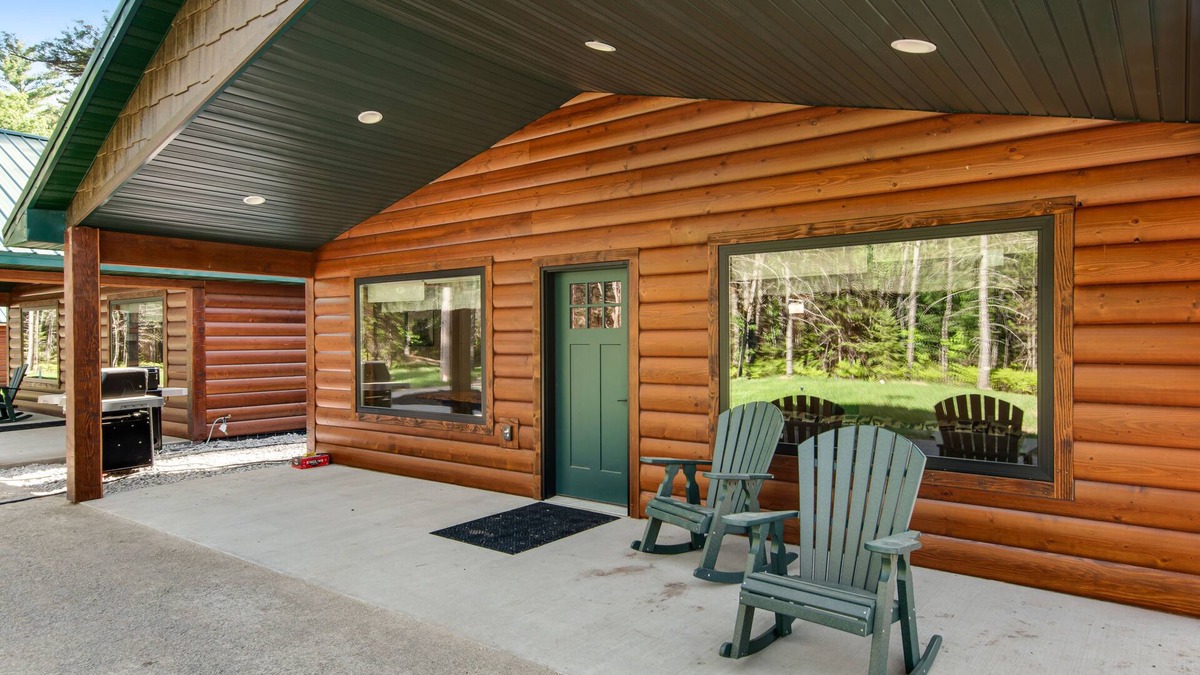 Conover House | Inviting dog-friendly cabin with hot tub, fireplace, patio, grill, central AC, & W/D