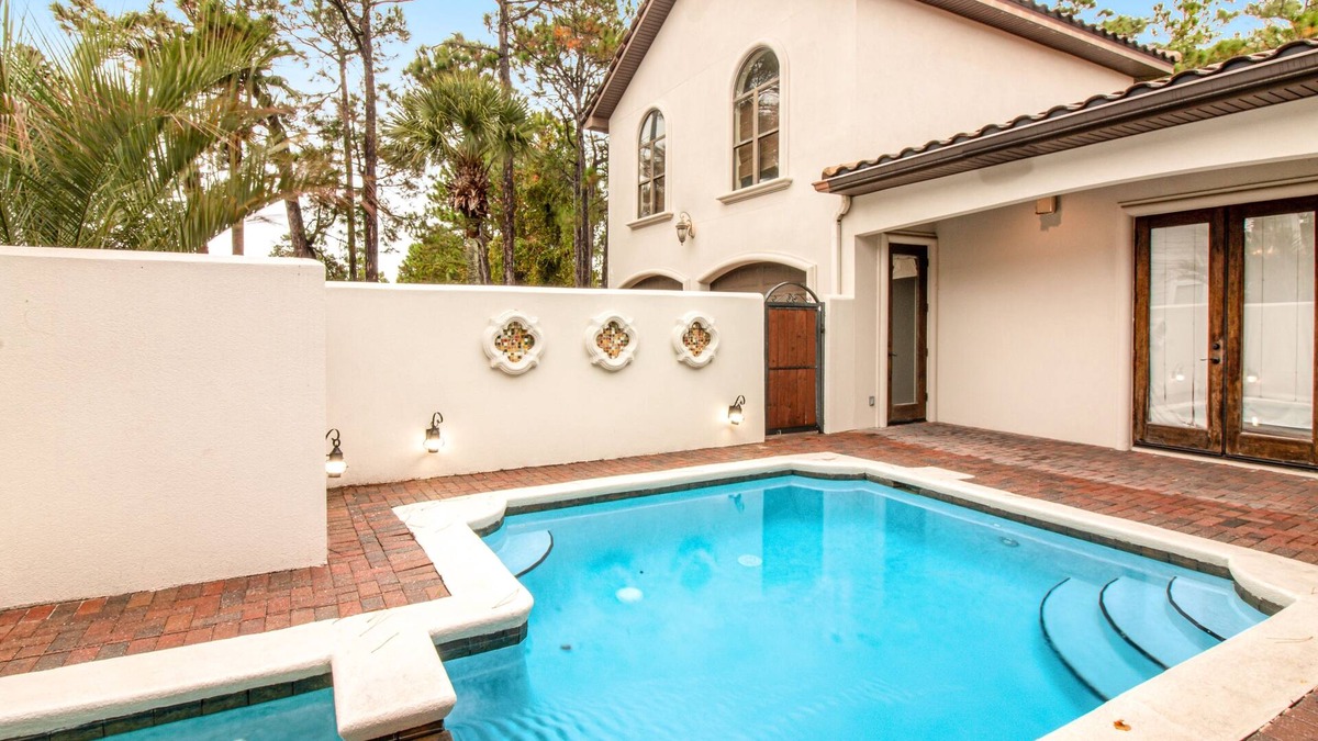 Emerald Waters Village House | Inviting home close to beach with pool, full kitchen, golf, central AC, & W/D
