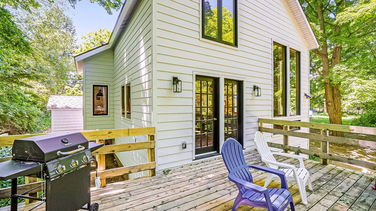 Benzonia House | Inviting home in great location with large deck, firepit, gas grill & streaming