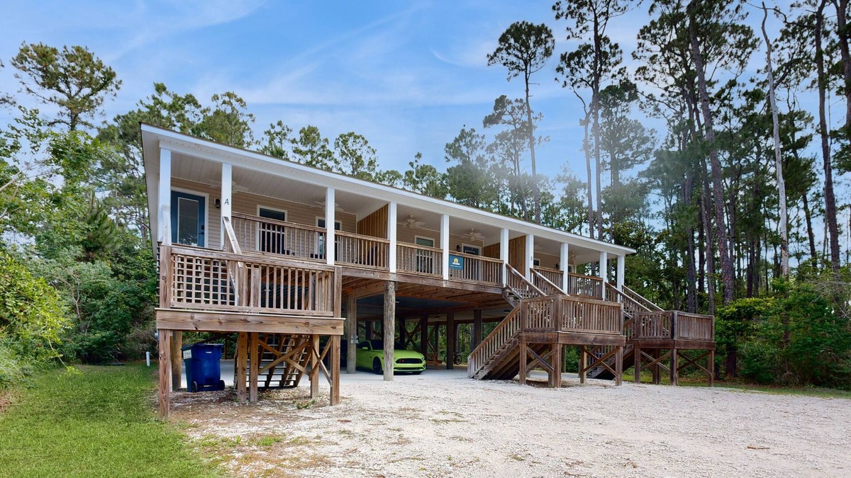 Dauphin Island House | Inviting home near the beach with balcony, full kitchen, central AC, & W/D