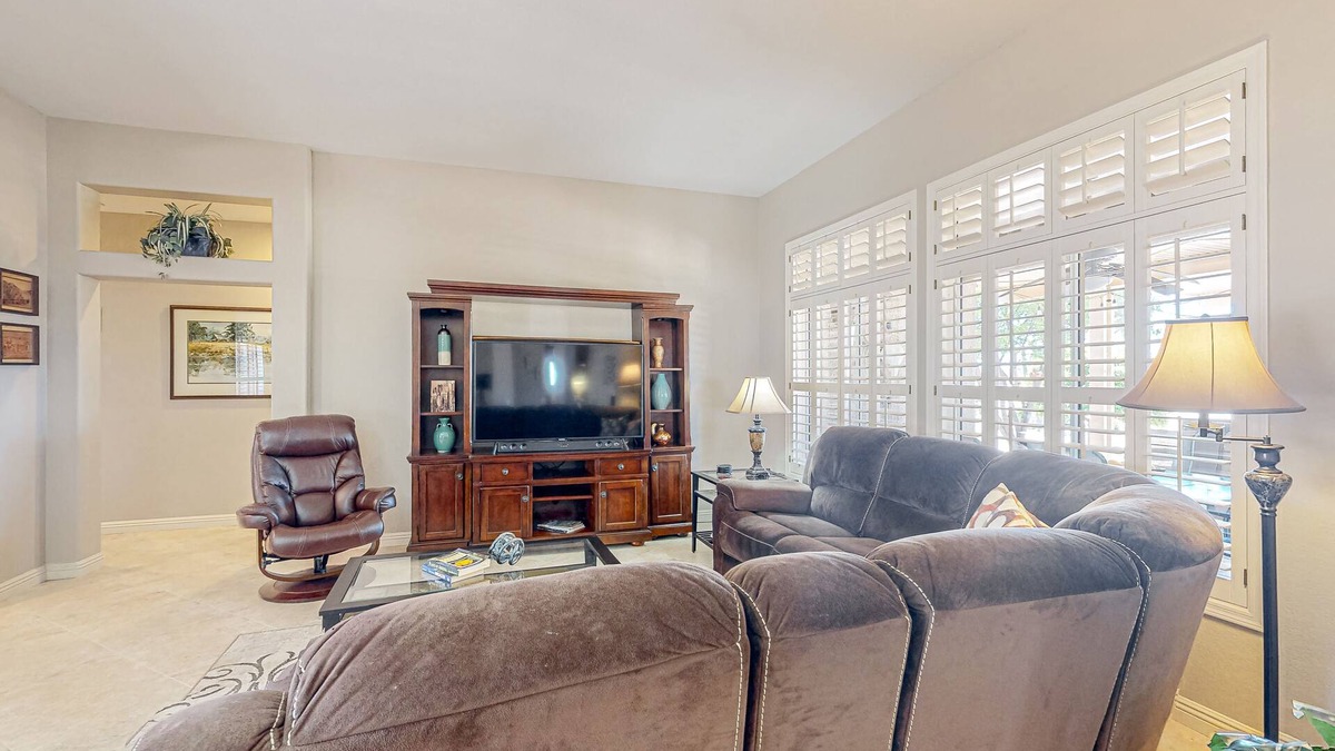 Sun City West House | Inviting home with full kitchen, patio, central AC, & W/D