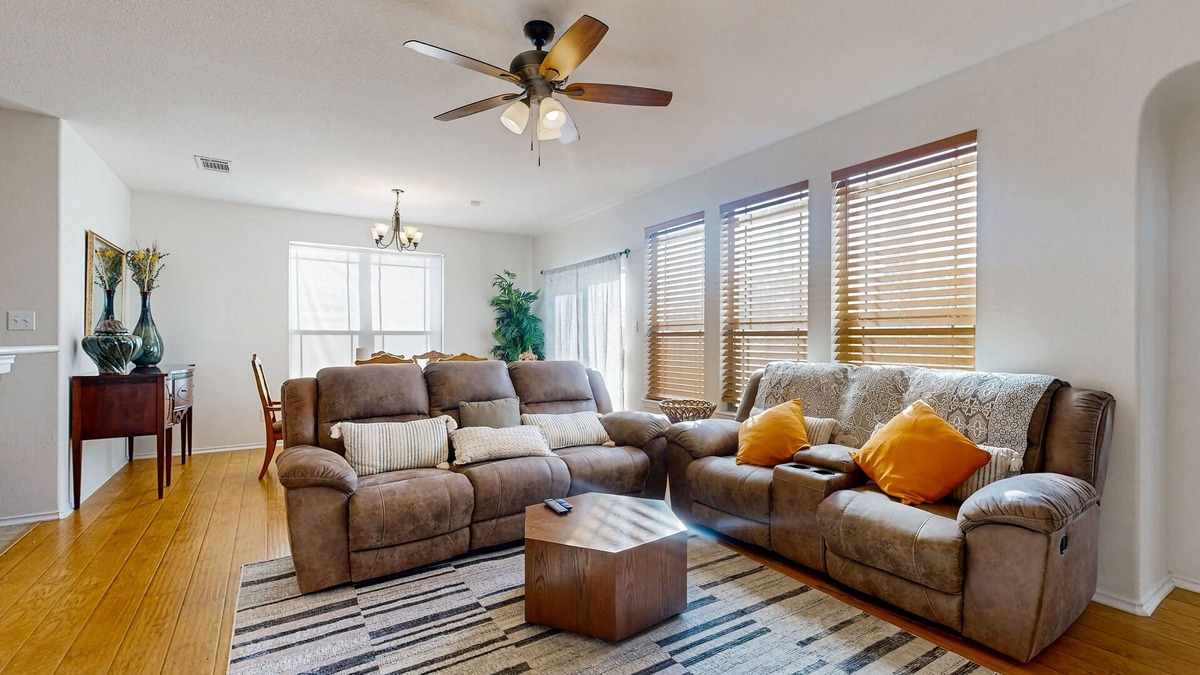 Round Rock House | Inviting home with enclosed yard and patio area with gas grill