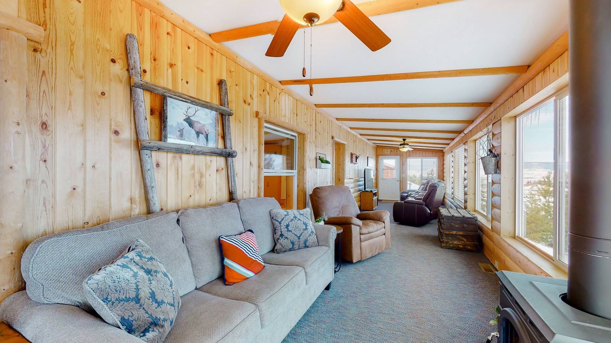 Polson House | Inviting lake view home with fireplace, golf nearby, full kitchen, & W/D